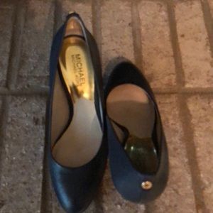 Dark navy pump shoes.